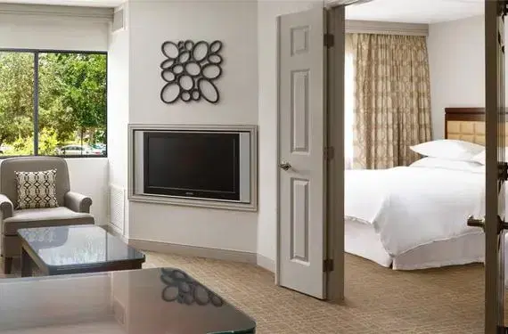 1 King Bed and Two-Person Sleeper Sofa