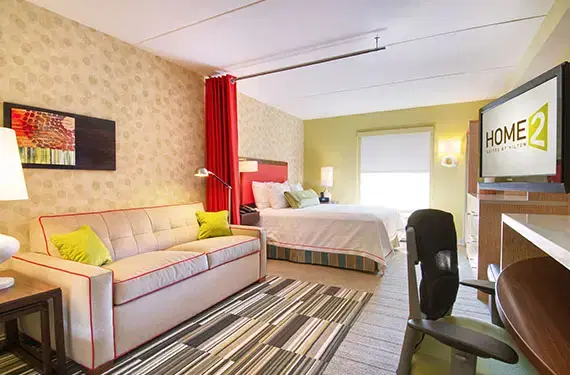 1 King Bed and Two-Person Sleeper Sofa