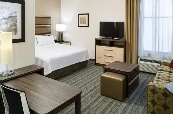 1 King Bed and Two-Person Sleeper Sofa