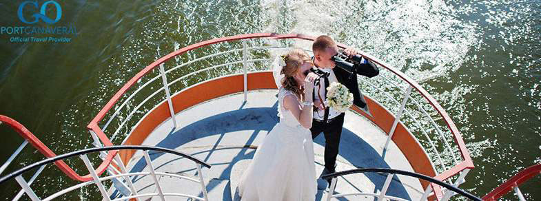 Wedding couple looking out to see with binoculars