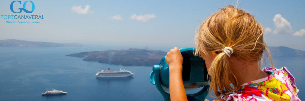 Girl looking at cruise ships with binoculars in Thira Santorini Greece