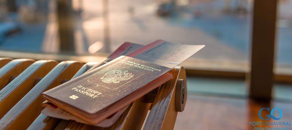 passports and tickets on a background of an airplane
