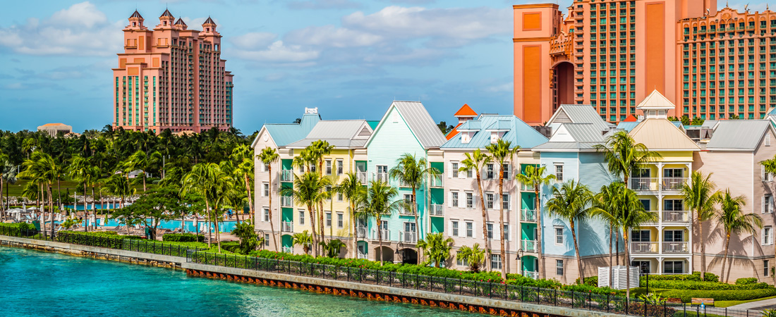 Colorful houses along the waterfront at the ferry terminal of Paradise Island, Nassau, Bahamas.