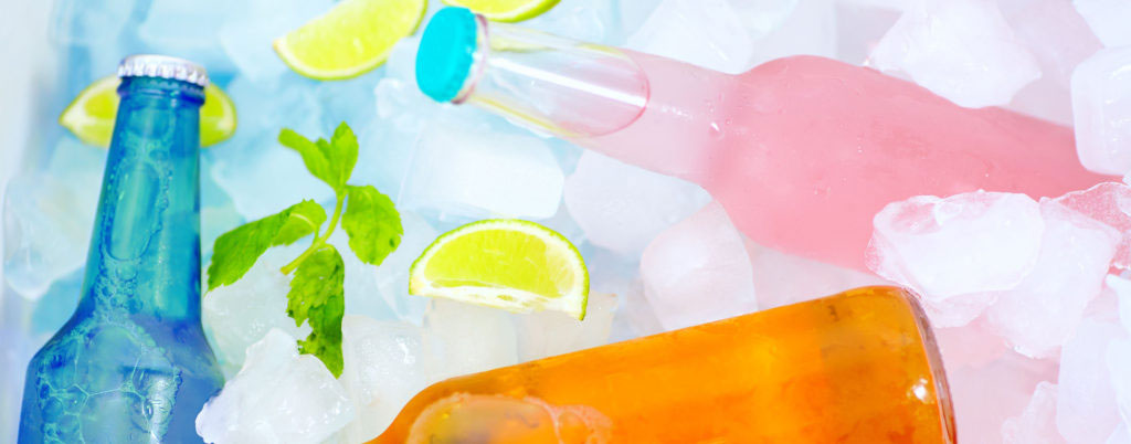 chilled colorful beverages in ice box. summer party ** Note: Shallow depth of field