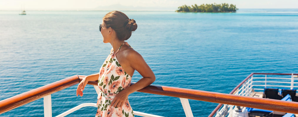 Woman on cruise looking out to sea