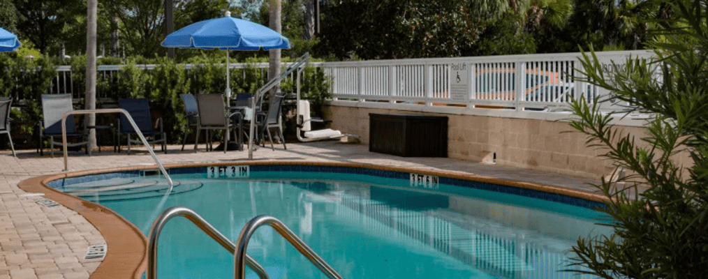 Fairfield Inn Titusville Kennedy Space Center exterior pool with wheelchair access swimming device