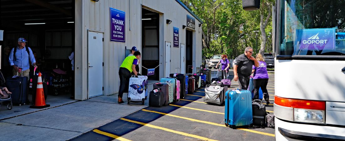 Greeters at Go Port Plaza loading and unloading luggage providing luggage assistance and great service to Port Canaveral cruisers