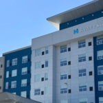 Hyatt House Orlando Airport hotel blue and white building