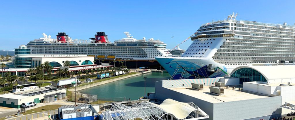 Wide view of two large cruise ship docked at Port Canaveral