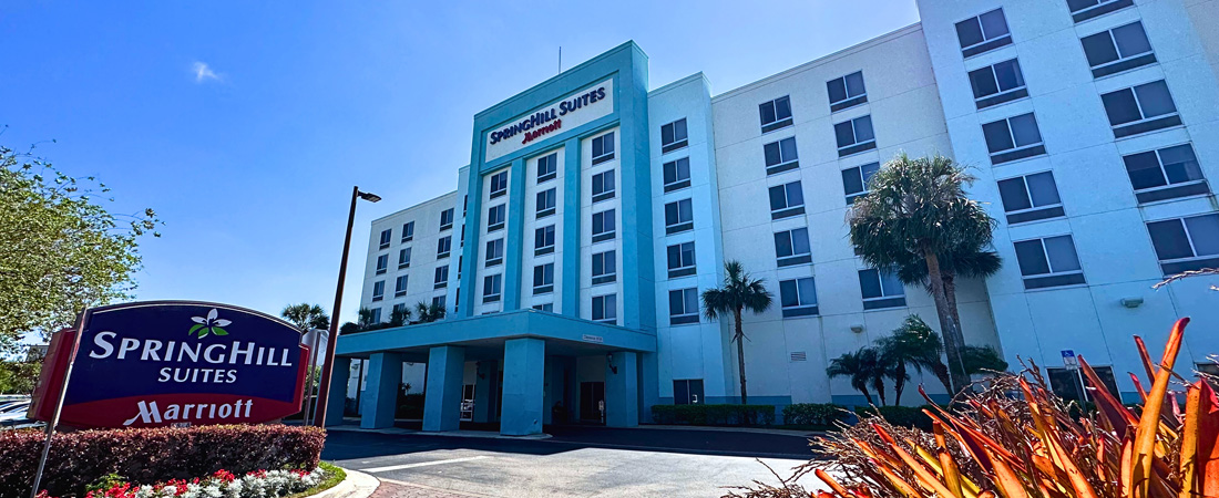 Front of SpringHill Suites Orlando Airport for guests who arrive a day before your Disney Fantasy cruise