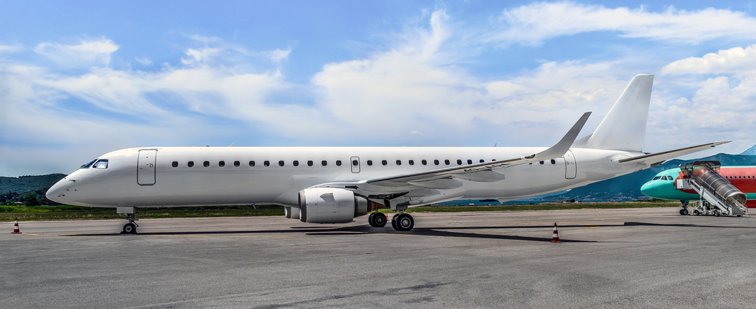 Side view of airplane on Orlando Airport (MCO) runway