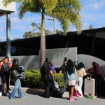 Cruisers boarding a shuttle to port canaveral at orlando airport