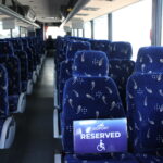 accesibilty seats held for customers on go port bus
