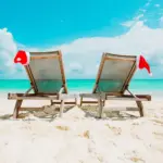 Santa hats on beach chairs