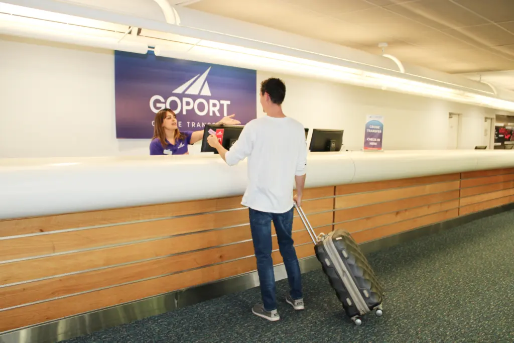 customer interacting with a go port counter employee
