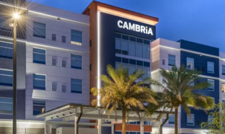 Cambria Hotel Orlando Airport exterior at night